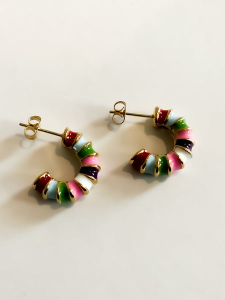 Multi Colored C Shaped EarringsThese beautiful Multi Colored C Shaped Earrings stand out with their unique design. They come in an eye-catching range of colors to perfectly complement any outfit.Multi Colored C Shaped EarringsThese beautiful Multi Colored