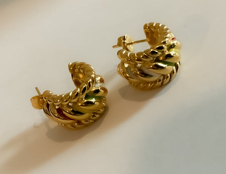 Multi Colored Gold C Twist EarringsThese beautiful Multi Colored C Shaped Earrings stand out with their unique design. They come in an eye-catching range of colors to perfectly complement any outfit.Multi Colored Gold C Twist EarringsThese beautiful Multi