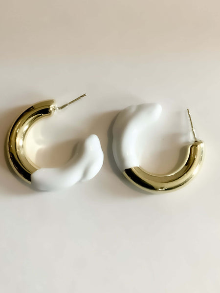 Color Dipped Gold C Shaped EarringsMake an elegant statement with these Color Dipped Gold plated C Shaped Earrings. Crafted with precision, these earrings feature a multi-color design with a gold plated finish. A perfect combination of style and class, ad