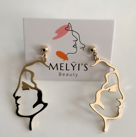 Two Facedgold outline melyis beauty sig earringsTwo Facedgold outline melyis beauty sig earrings$6.85Melÿi’s Beauty