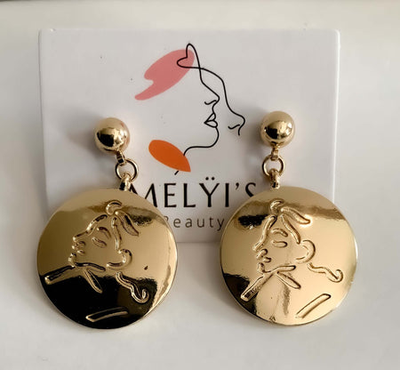 Gold Coin Stud EarringsThese Gold Coin Stud Earrings feature a classic stencil face design crafted from solid gold for long-lasting beauty and shine. Enjoy the luxury of these timeless accessories that add sophistication to any outfit.Gold Coin Stud Earri