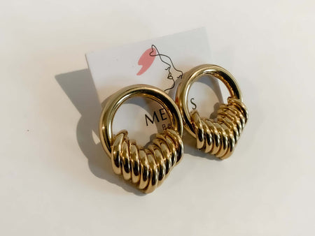 Gold Chunky Hoop Stud EarringsThese sophisticated minimalist Gold Chunky Hoop Stud Earrings are the perfect finishing touch to any outfit. Crafted from shining gold metal with a smooth finish, they are light and comfortable to wear. Add a touch of luxury