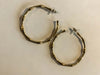 Beach Bae Gold HoopsThese beach-inspired gold hoops feature a slim bamboo texture design and are perfect for adding a touch of tropical style to your look. Crafted from lightweight metal, they’re a lightweight and comfortable choice for everyday wear. Siz